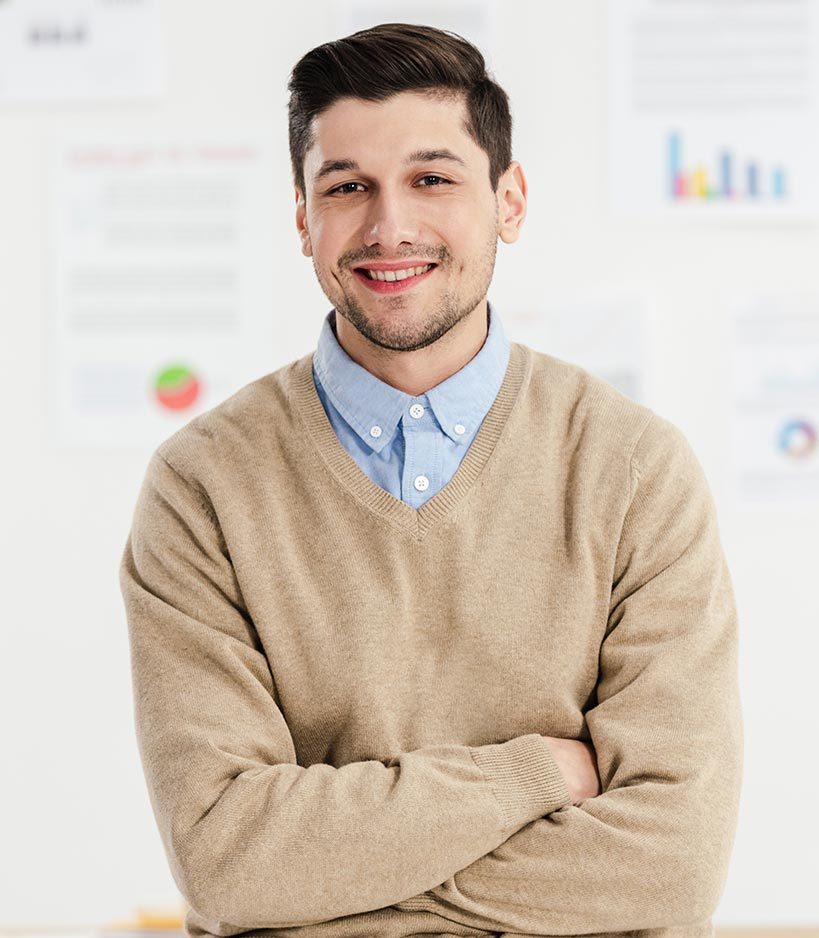 portrait of smiling marketing manager with arms cr 2022 12 16 16 16 02 utc e1701282999543.jpg